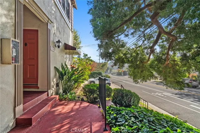 a view of a backyard of the house