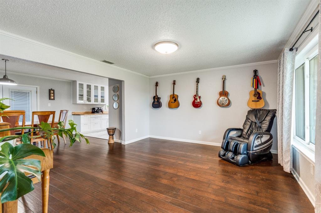 109 North Ash Avenue Azle, TX 76020 - Photo 19 of 25 a view of a room with gym equipment