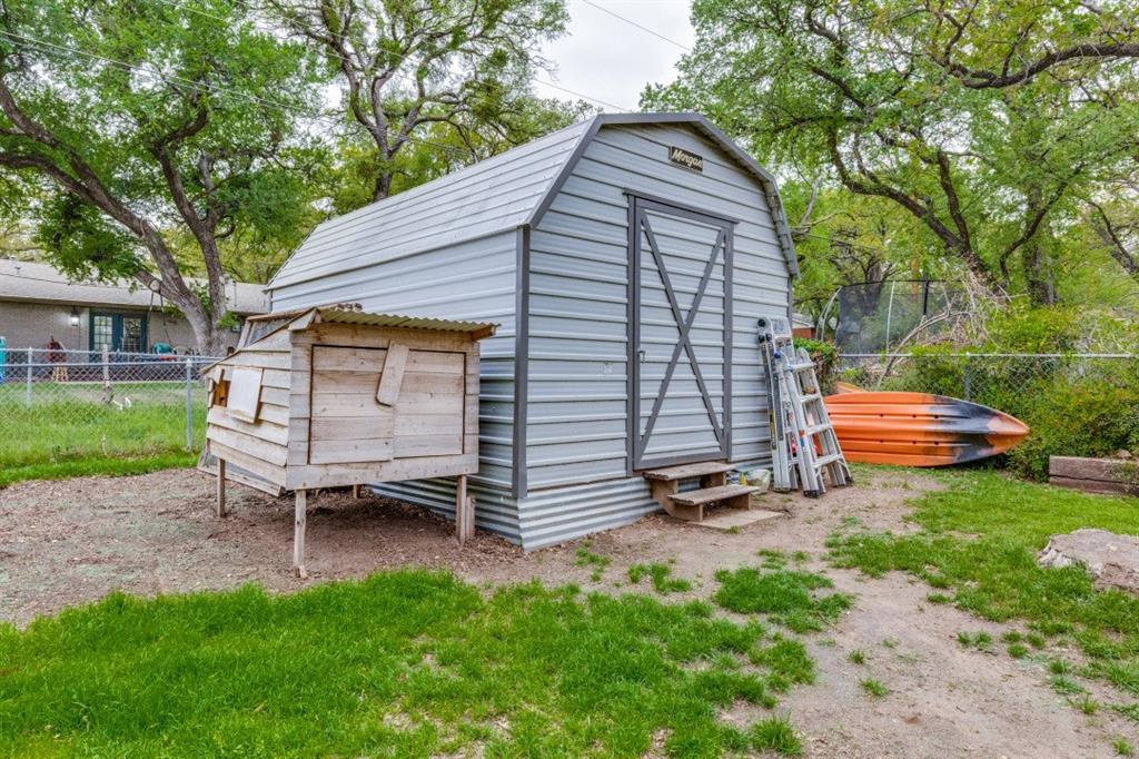 109 North Ash Avenue Azle, TX 76020 - Photo 25 of 25 a backyard of a house with barbeque oven