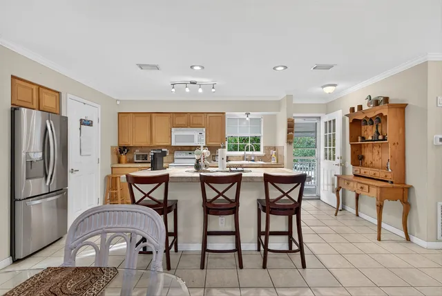 a bedroom with a bed and a table in it