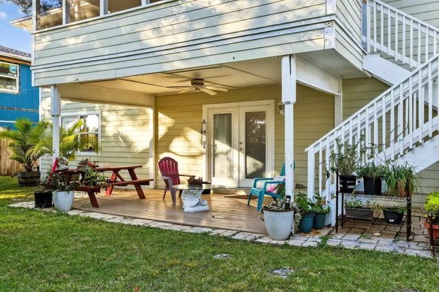 a picture of a bathroom with a white refrigerator