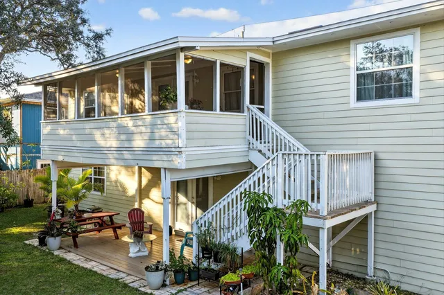 a picture of a room with a window and a table