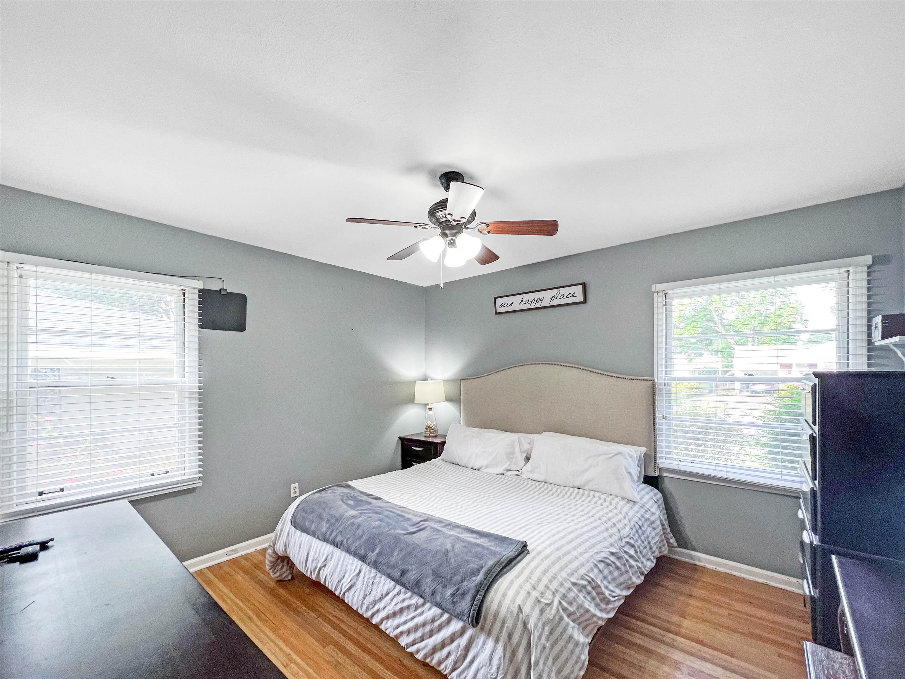 1396 Whitewater Road Memphis, TN 38117 - Photo 14 of 25 a bedroom with a bed and window