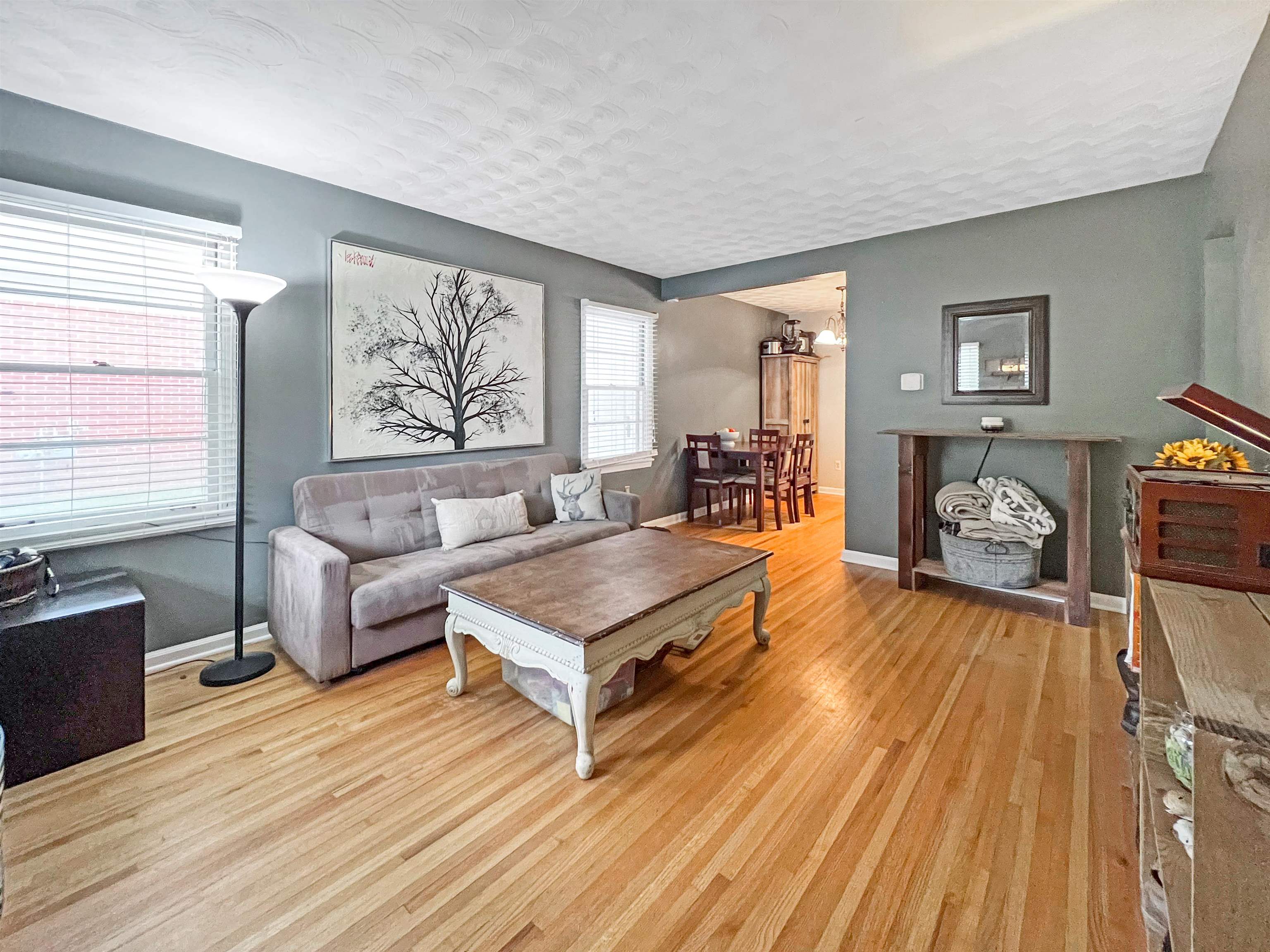 1396 Whitewater Road Memphis, TN 38117 - Photo 2 of 25 a living room with furniture and a wooden floor