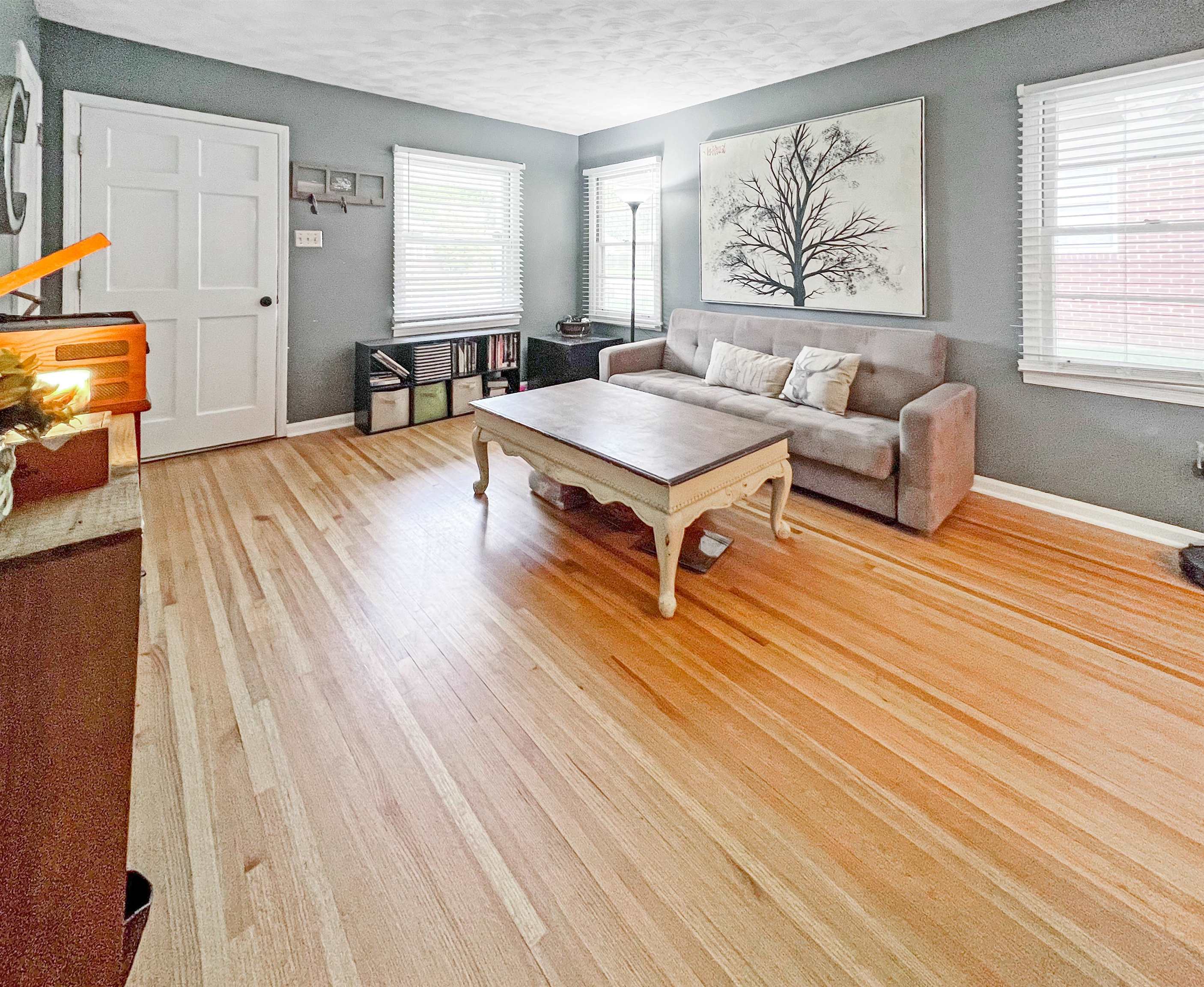 1396 Whitewater Road Memphis, TN 38117 - Photo 3 of 25 a living room with furniture and a wooden floor