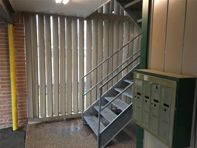 a view of entryway with stairs