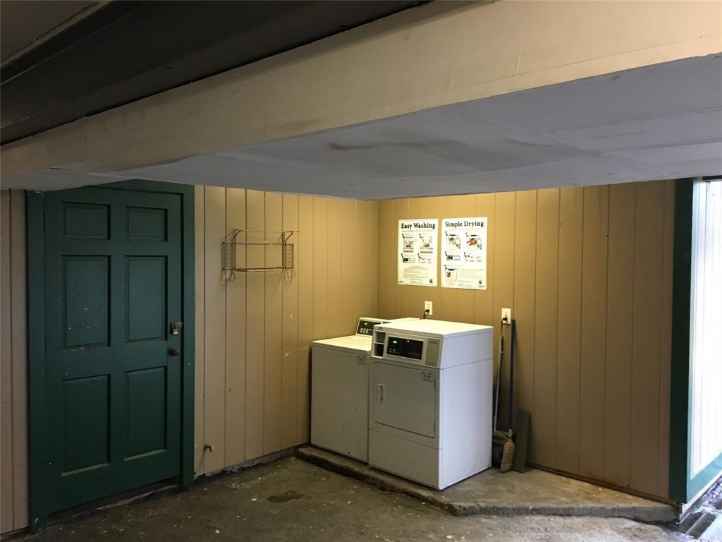7323 Lindencrest Street, Unit 9 Houston, TX 77061 - Photo 6 of 6 a view of a kitchen with wooden floor and windows