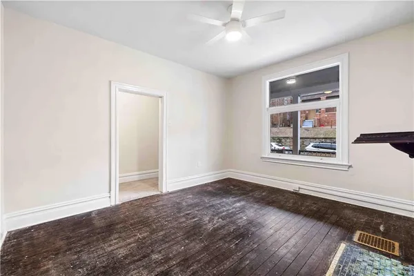 a view of porch with wooden floor