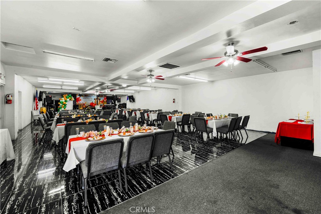 17606 Arrow Fontana, CA 92335 - Photo 15 of 30 a group of people sitting in a room