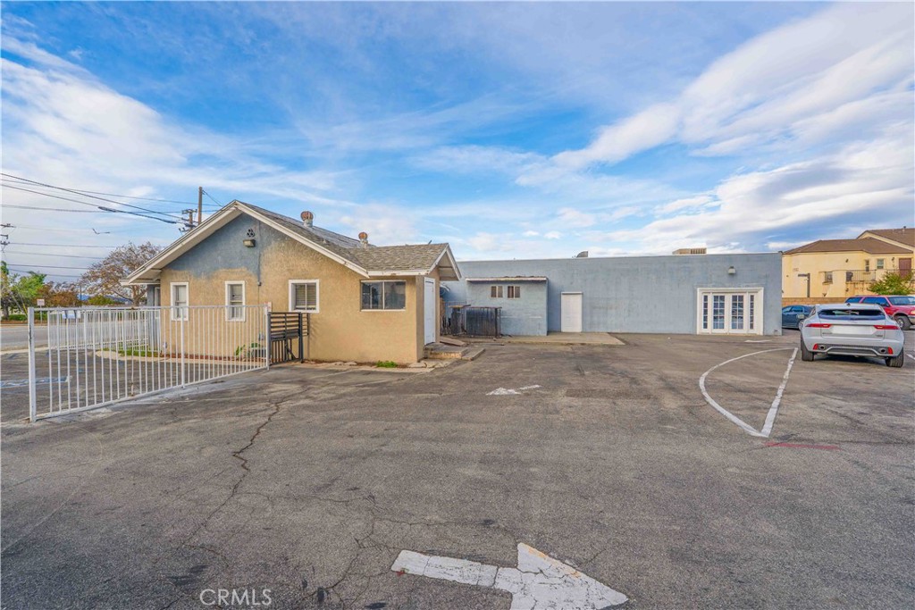 17606 Arrow Fontana, CA 92335 - Photo 3 of 30 a view of a house with a patio and a yard