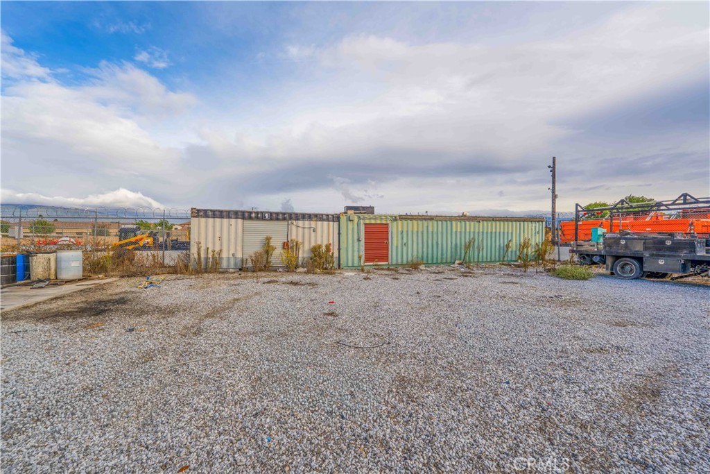 17606 Arrow Fontana, CA 92335 - Photo 7 of 30 a view of a big room with large windows and a yard