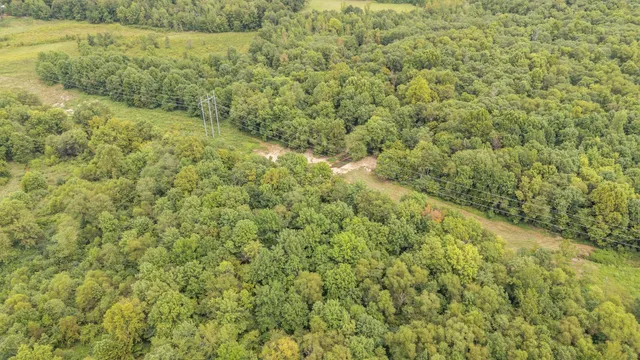 a view of a lake with a yard