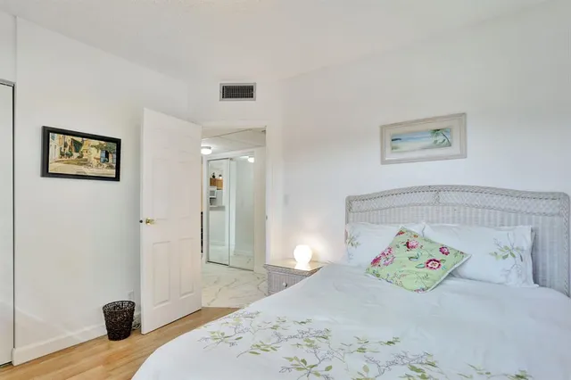 a room with gym equipment and windows