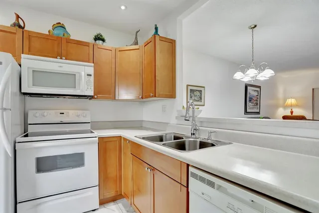 a view of a garden with a building in the background