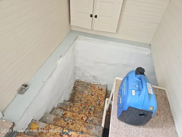 a storage room with washer and dryer