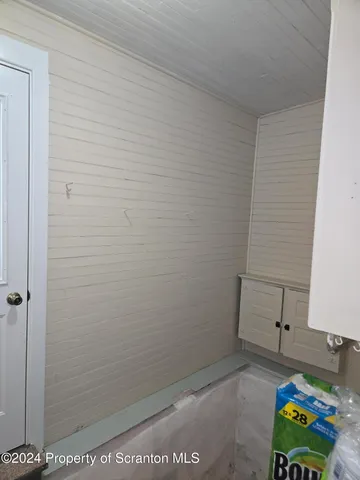 a room with storage and utility