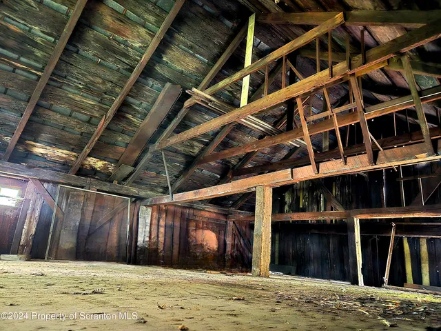 a view of a backyard of the house