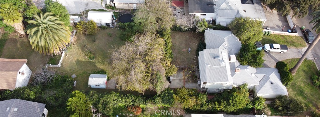 19131 Lanark Street Reseda, CA 91335 - Photo 11 of 14 an aerial view of a house with outdoor space and trees all around