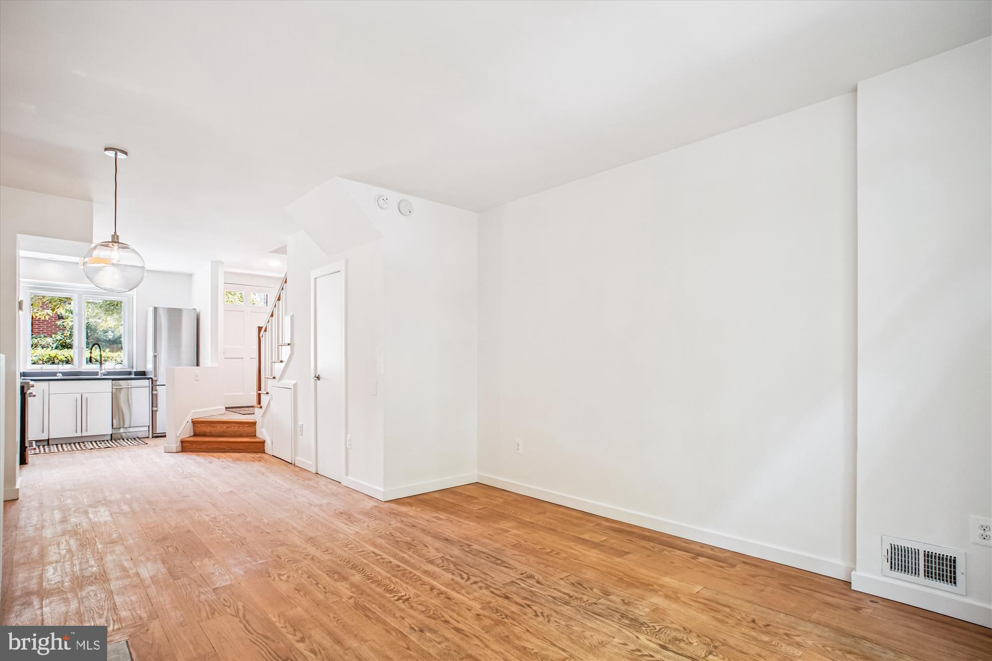 1229 Portner Road Alexandria, VA 22314 - Photo 13 of 47 a view of empty room with wooden floor and window