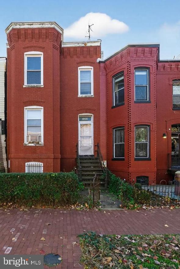 1002 S Street Northwest Washington, DC 20001 - Photo 3 of 8 a front view of a house
