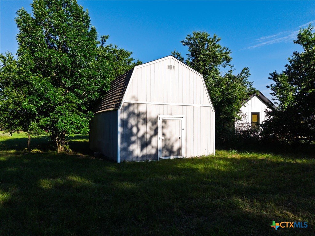 2739 Willow Loop Kempner, TX 76539 - Photo 20 of 30 a view of backyard with garden and trees