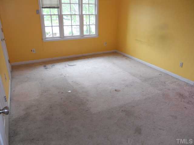 2960 Faversham Place Raleigh, NC 27604 - Photo 6 of 6 an empty room with a window