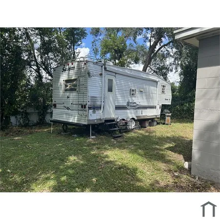 a black and white photo of a house