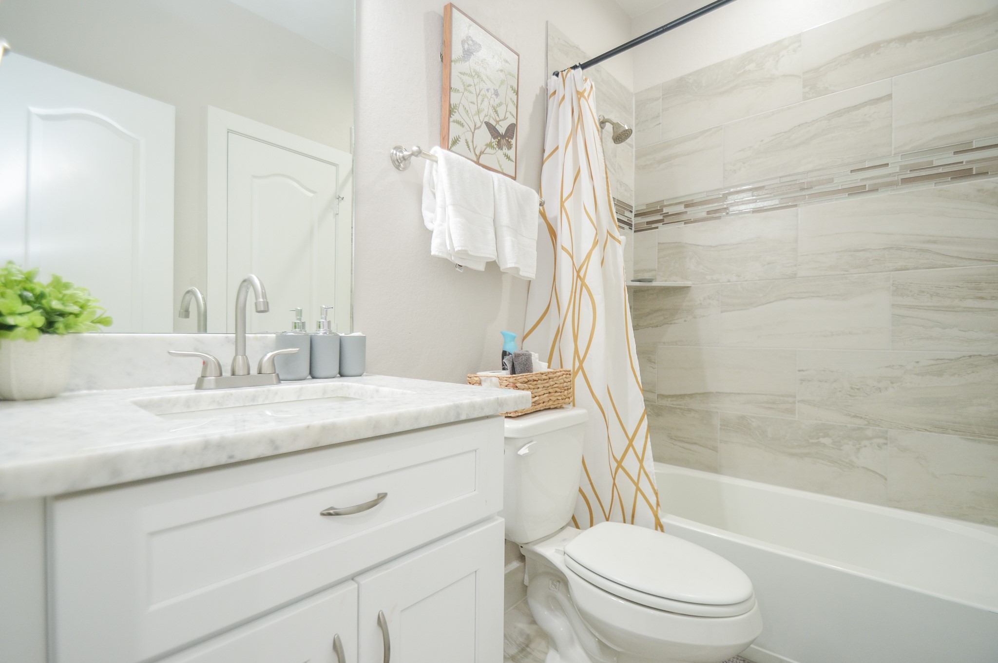 4511 Reed Road Houston, TX 77051 - Photo 26 of 39 a bathroom with a granite countertop sink toilet and shower