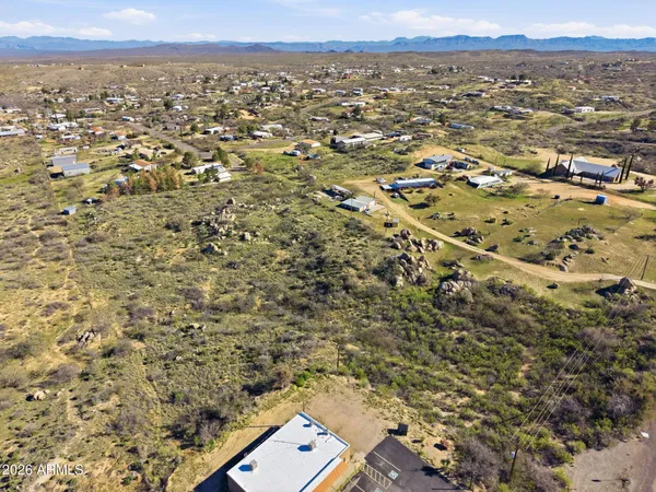 an aerial view of residential building and green space