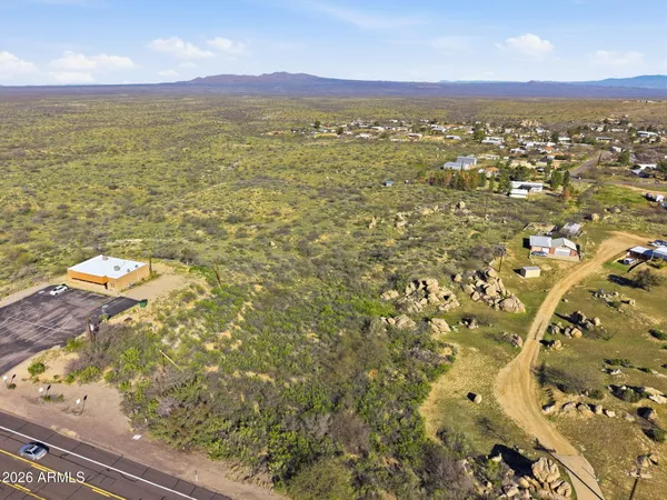 a view of an ocean from a mountain