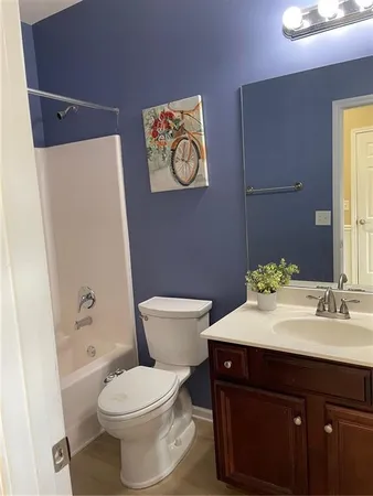 a bathroom with a sink and a toilet