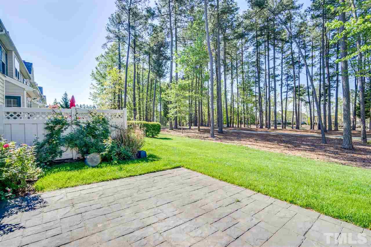 11115 Maplecroft Court Raleigh, NC 27617 - Photo 15 of 25 a front view of a house with garden