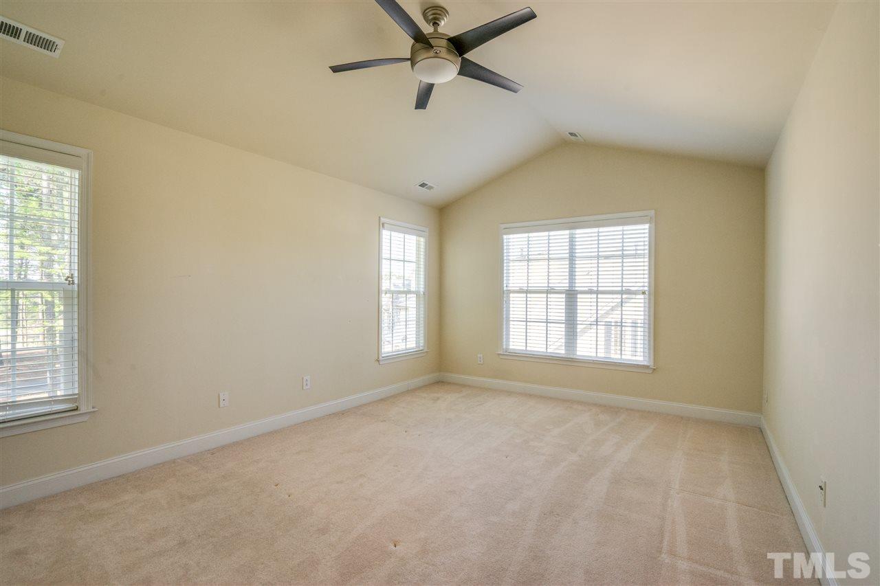 11115 Maplecroft Court Raleigh, NC 27617 - Photo 19 of 25 a view of an empty room with a window