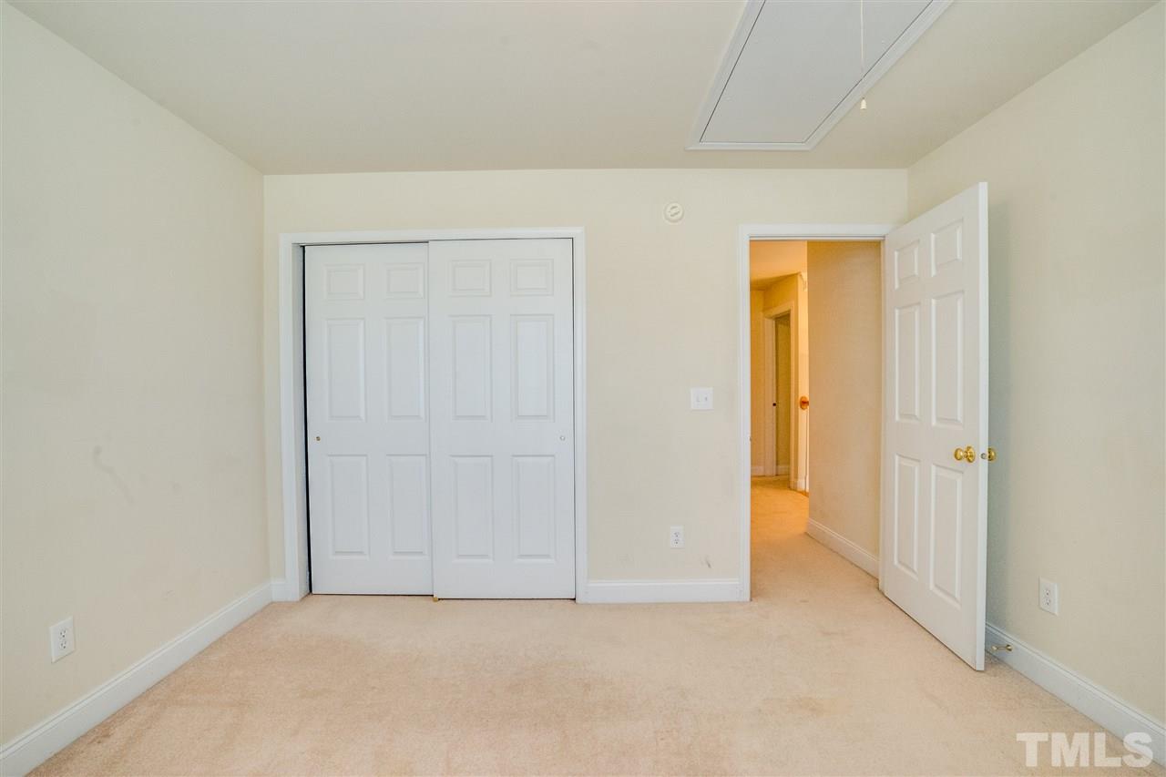 11115 Maplecroft Court Raleigh, NC 27617 - Photo 24 of 25 an empty room with closet area