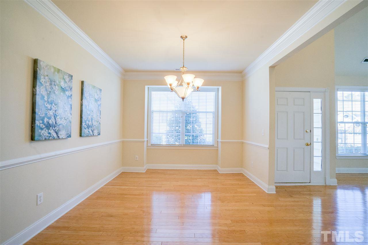 11115 Maplecroft Court Raleigh, NC 27617 - Photo 7 of 25 a view of an empty room with a window