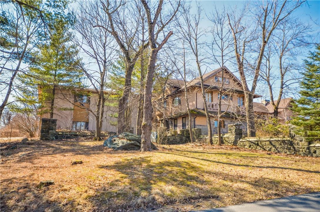 620 Sleepy Hollow Road Briarcliff Manor, NY 10510 - Photo 5 of 10 a view of a building with snow on the roadside