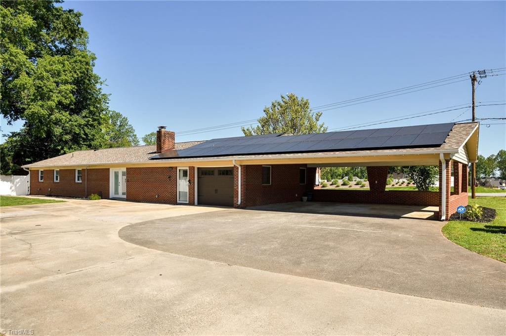 3025 Hickory Tree Road Winston-Salem, NC 27127 - Photo 3 of 33 Lots of concrete for parking or for play!