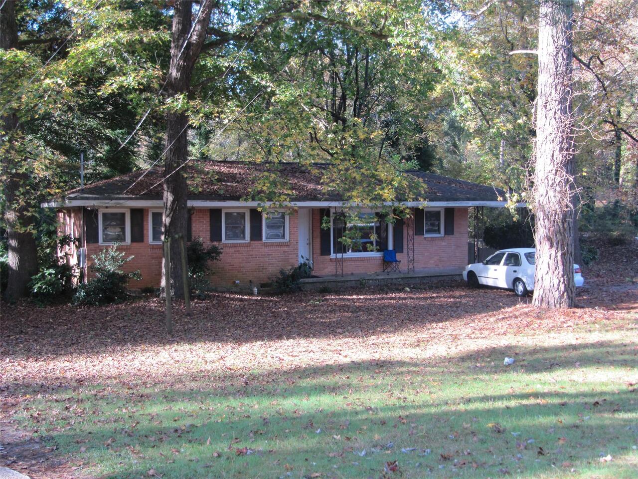 3313 Pinehill Drive, Unit 12 Decatur, GA 30032 - Photo 1 of 1 a view of a house with backyard