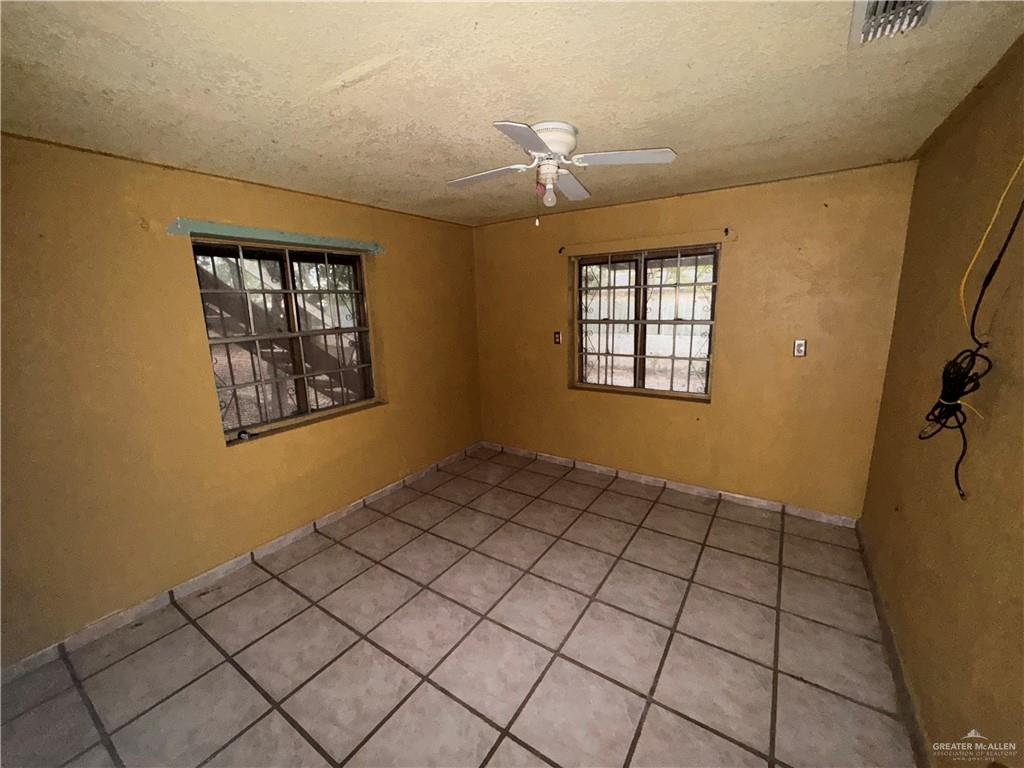 1306 North Rau-Con Street Roma, TX 78584 - Photo 21 of 34 a view of an empty room and window