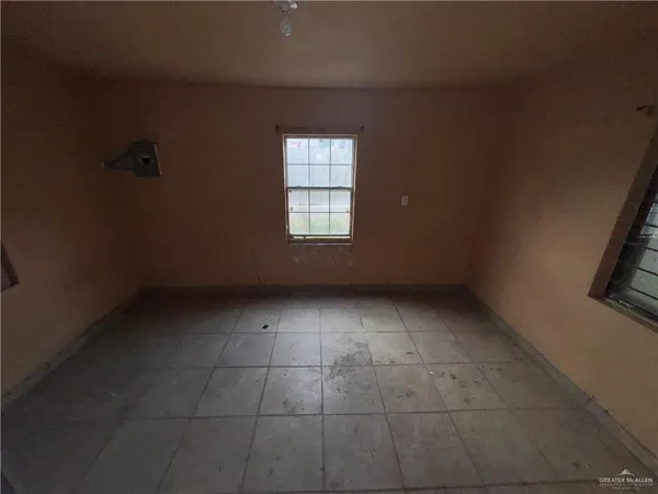 a room with furniture and window