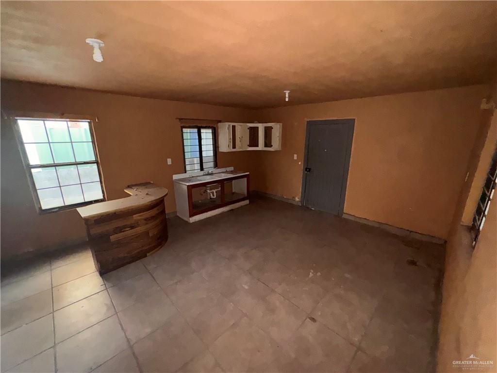 1306 North Rau-Con Street Roma, TX 78584 - Photo 26 of 34 a room with furniture and window