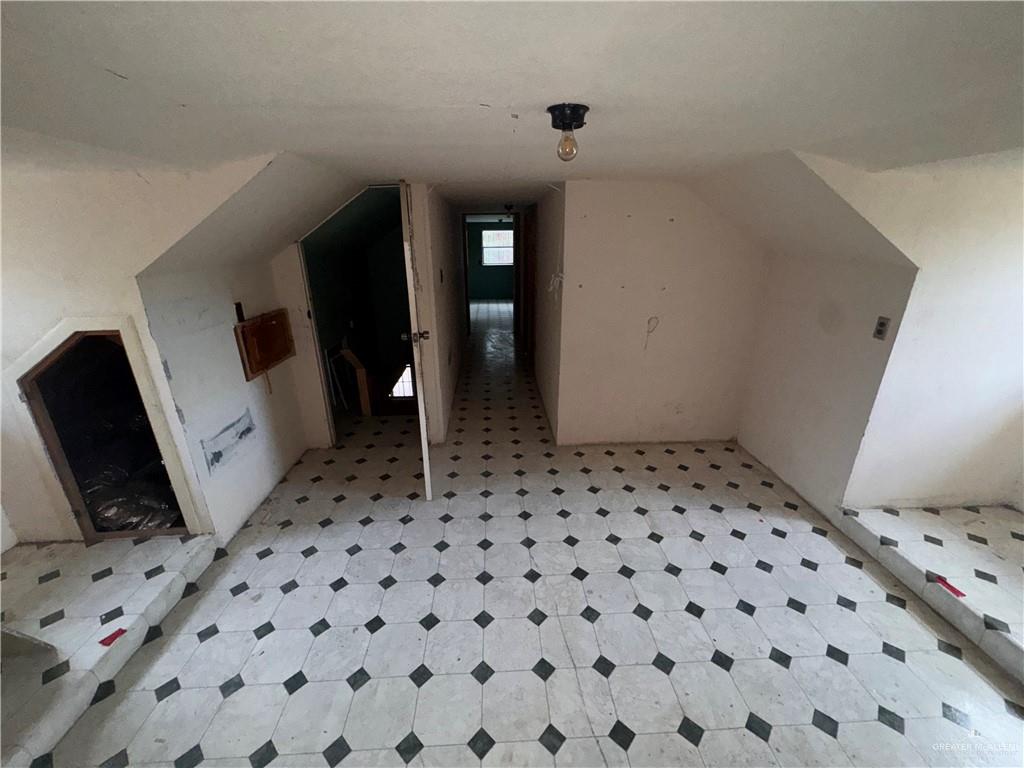 1306 North Rau-Con Street Roma, TX 78584 - Photo 30 of 34 a bathroom with a sink and a mirror