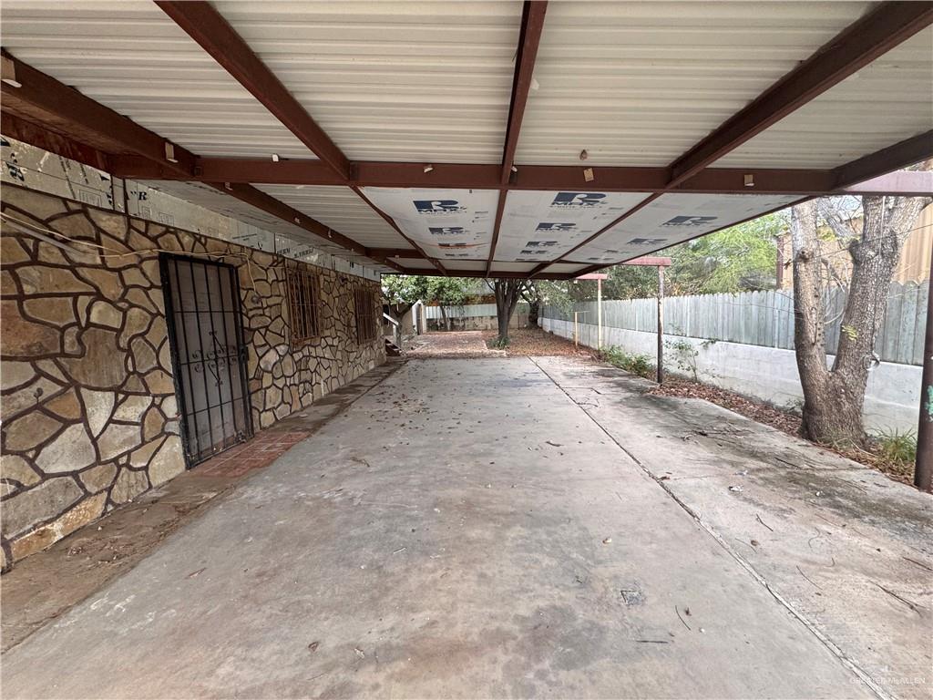 1306 North Rau-Con Street Roma, TX 78584 - Photo 3 of 34 a view of empty room with wooden walls