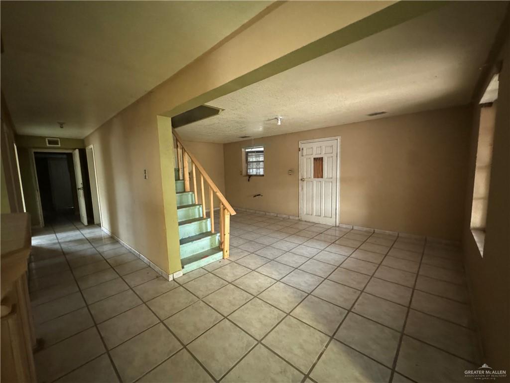 1306 North Rau-Con Street Roma, TX 78584 - Photo 9 of 34 a view of a hallway with window