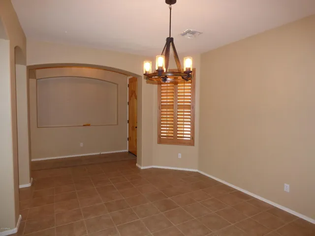 a kitchen with granite countertop a sink and a granite counter tops