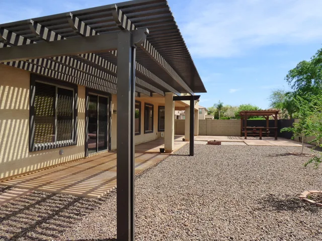a view of a park with plants and trees