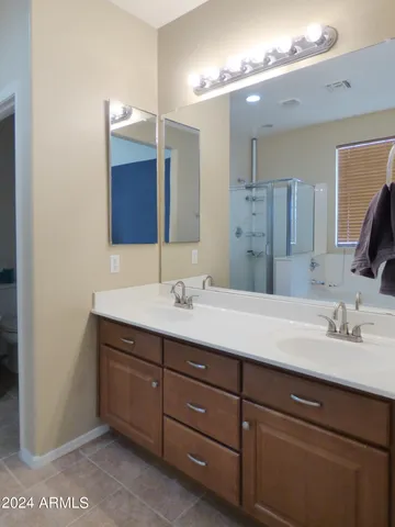 a view of a room with a cabinet and a window
