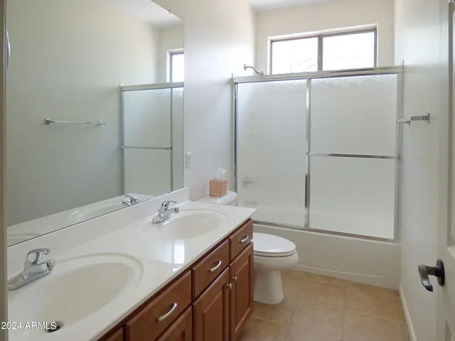 a view of a park with plants and trees