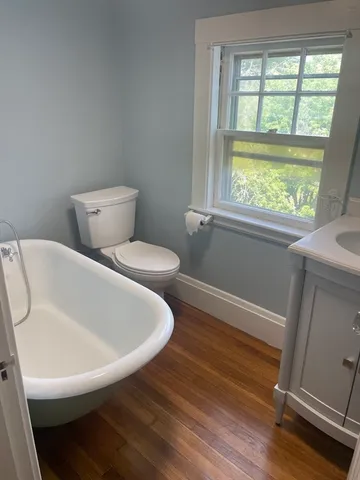 a bathroom with a toilet and a sink