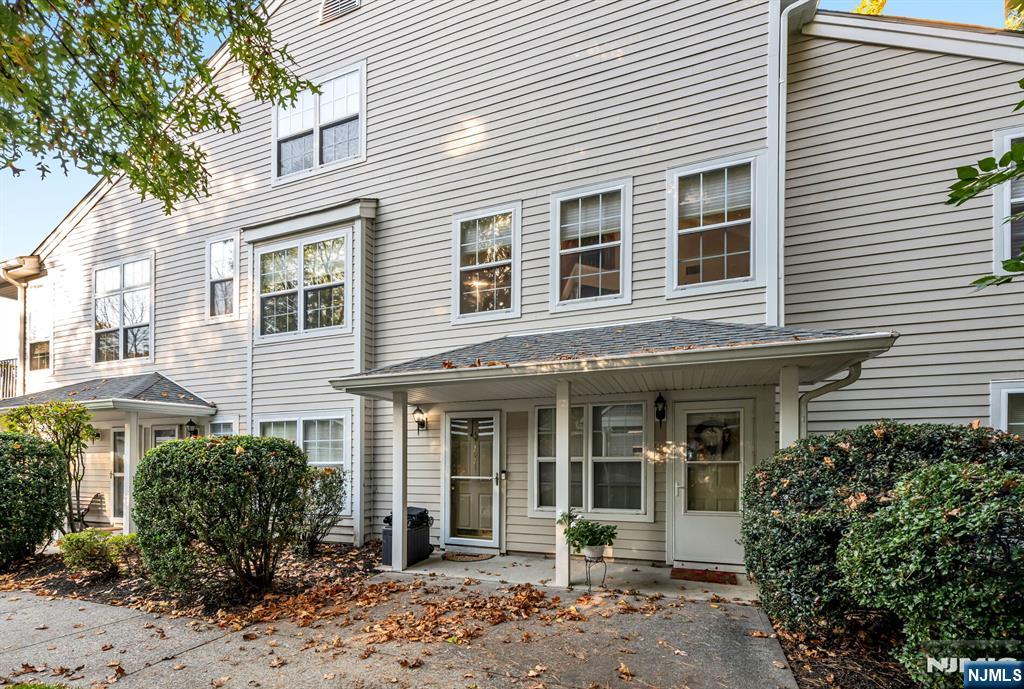 1034 Castle Road Mahwah, NJ 07430 - Photo 2 of 21 a front view of a house with a yard